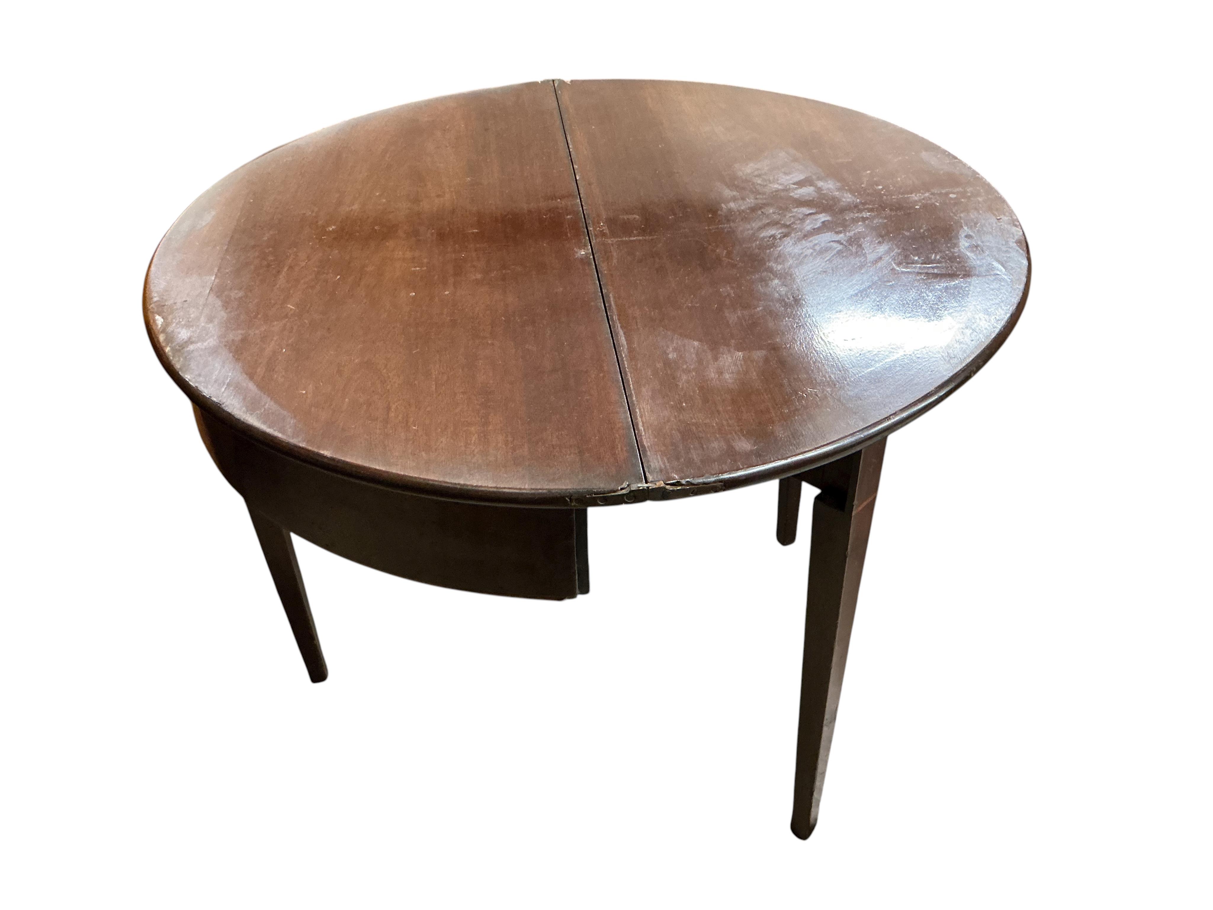 A George III mahogany demi-lune folding tea table, width 94cm, depth 46cm, height 73cm